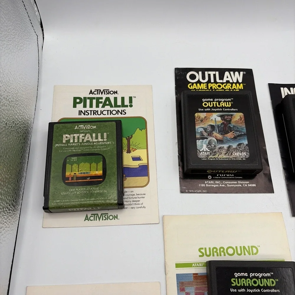 Lot of 8 Atari 2600 Games Pac-Man Pitfall Missile Command Berzerk with Manuals